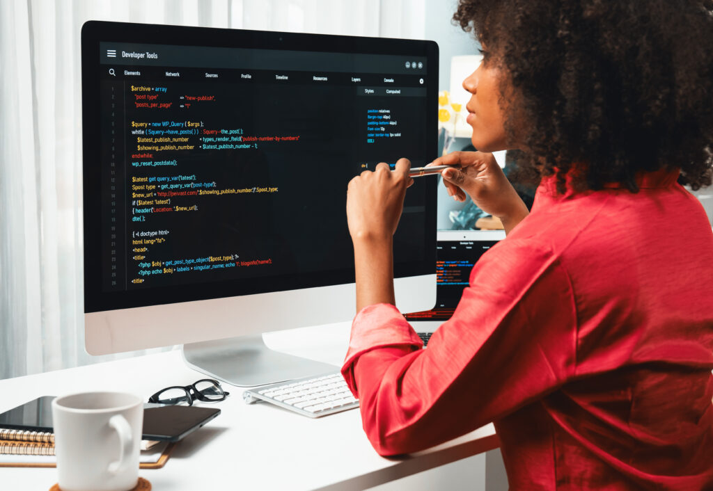 african american's developer. coding software project on screen. tastemaker.