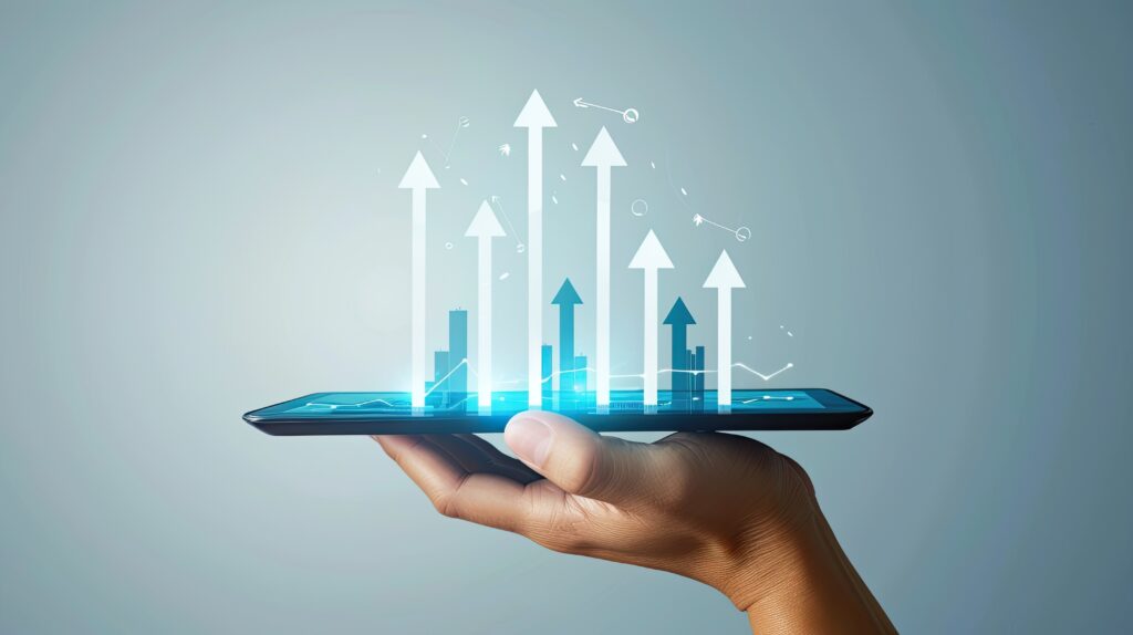 digital growth shown by rising arrows on tablet screen in hand