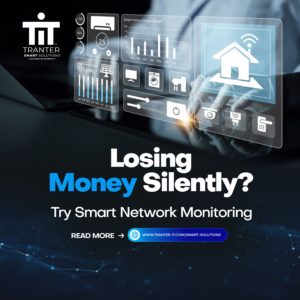 Promotional graphic from Tranter Smart Solutions. The image features a dark, professional tech background with a digital overlay showing energy usage graphs, smart technology icons, and a person's hands interacting with a holographic interface. The central text reads, 'Losing Money Silently? Try Smart Network Monitoring,' followed by a 'READ MORE' button containing the link to tranter-it.com/smart-solutions.